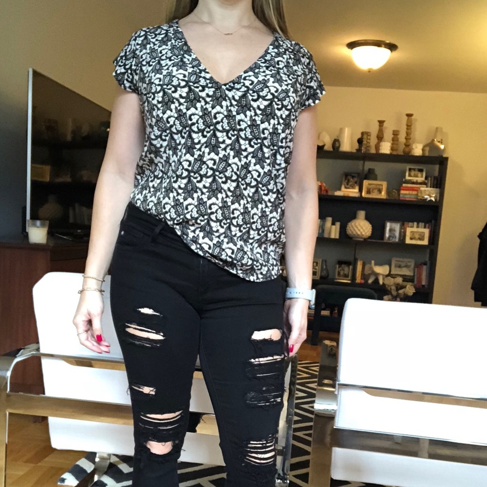 Joie black and white “lacy” top